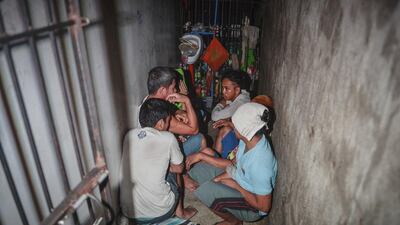 The Philippines’ Commission on Human Rights raided a Manila police station on April 27, 2017, following a tip and found a dozen drug suspects crammed inside a tiny room hidden behind a bookshelf with no light and no ventilation. EPA