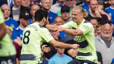 Erling Haaland celebrates with Ilkay Gundogan after scoring City's second goal. EPA