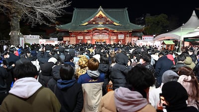 People visit Kanda Myojin Shrine to offer New Year prayers in Tokyo. AFP
