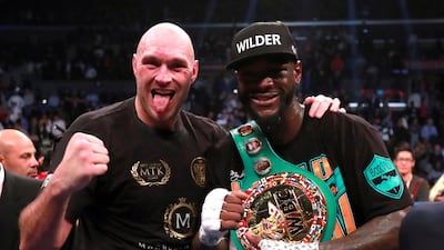 Deontay Wilder and Tyson Fury after the fight. Reuters