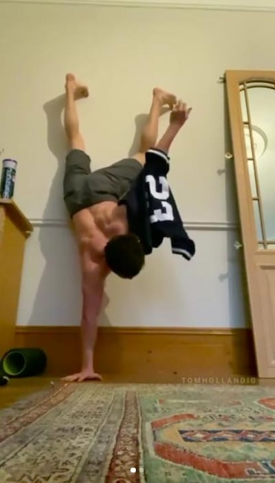 Marvel actor Tom Holland mid-handstand challenge. Instagram