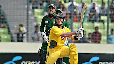 Australia's Shane Watson smashes one of his 15 sixes in Dhaka. Mir Farid / AP Photo