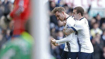 Christian Eriksen and Kieran Trippier of Tottenham celebrate after Eriksen’s opening goal on Saturday against Sunderland. Paul Childs / Action Images / Reuters