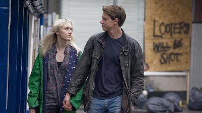 Saoirse Ronan, left, and George MacKay in a scene from How I Live Now. AP Photo / Magnolia Pictures