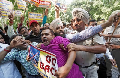 Activists protest against Walmart in New Delhi, India. Adnan Abidi/Reuters