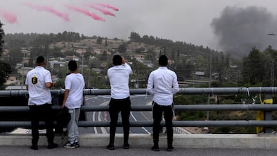 A military aircraft drops fire retardant on fires near Jerusalem. Getty images