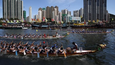 Participants compete in a dragon boat race in Hong Kong on Saturday at the start of the Chinese Dragon Boat Festival. Kin Cheung / AP