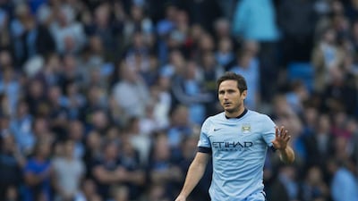Frank Lampard reacts after scoring against Chelsea in Manchester City's 1-1 draw on Sunday. Jon Super / AP / September 21, 2014
