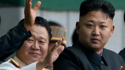(FILES) In a file photo taken on July 26, 2013 North Korean leader Kim Jong-un with Choe Ryong Hae during a mass games display in 2013. AFP