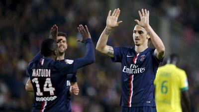 Paris Saint-Germain's Blaise Matuidi celebrates with his teammate Zlatan Ibrahimovic after scoring against Nantes in their Ligue 1 victory on Sunday. Stephane Mahe / Reuters / May 3, 2015