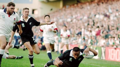 Jonah Lomu dives over for a try during the 1995 Rugby World Cup match between England and New Zealand played in Cape Town, South Africa. Dave Rogers /Allsport