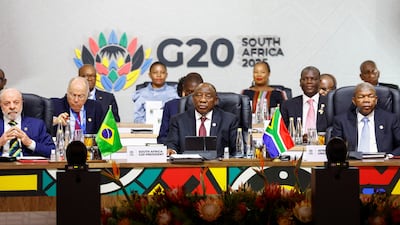 South African President Cyril Ramaphosa with Brazil's President Luiz Inacio Lula da Silva and chairman of the African Union, Angolan President Joao Lourenco, during a plenary session on the opening day of the G20 Summit in Johannesburg. Reuters