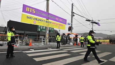 A banner welcoming Jin. AFP