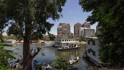 One of the houseboats usually moored between the Zamalek district Cairo and the Agouza district Giza in the foreground.