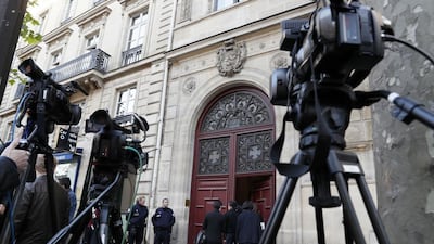 Cameras are set up as police officers stand guard at the entrance to a hotel residence at the Rue Tronchet, near Madeleine, central Paris, on October 3, where US reality television star Kim Kardashian was robbed at gunpoint by assailants disguised as police who made off with millions, mainly in jewellery. Thomas Samson / AFP