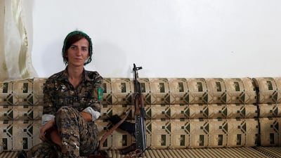 Sheen Ibrahim, Kurdish fighter and sharp-shooter from the People's Protection Units (YPG) in Raqqa, Syria on June 16, 2017. Goran Tomasevic / Reuters