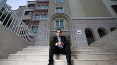 Sabri Pozem, the owner of a flat in Discovery Gardens where after several months he has still not received his title deed from Nakheel.
