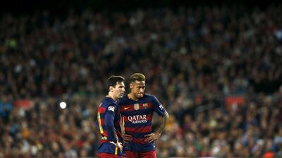 Barcelona’s Neymar and Messi react against Valencia. REUTERS/Albert Gea