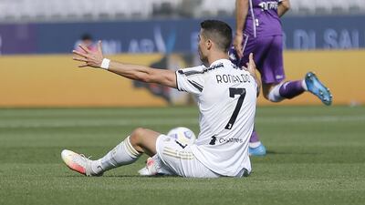 Juventus star Cristiano Ronaldo takes a tumble against Fiorentina. Getty