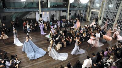 The collection includes floor-length, A-line and mini dresses in lilac, mint green and shimmering metallics. Photo: Daniel John Cotton Wall