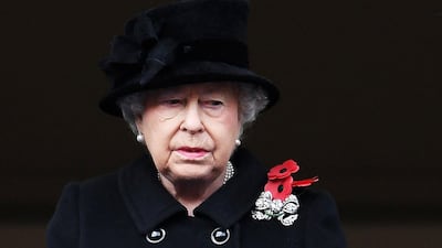 Britain's Queen Elizabeth II watches the Remembrance Sunday service from the Foreign and Commonwealth balcony in London. Andy Rain / EPA
