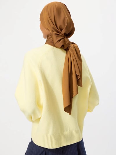The Satin hijab has a subtle sheen. Photo: Uniqlo