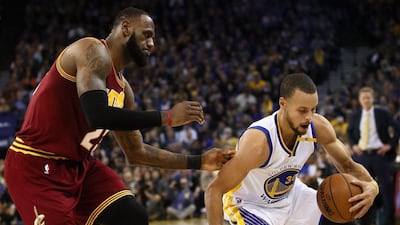 Stephen Curry of the Golden State Warriors steals the ball from LeBron James of the Cleveland Cavaliers at ORACLE Arena on January 16, 2017 in Oakland, California. Ezra Shaw / Getty Images