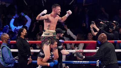 Josh Taylor celebrates after after beating Jose Ramirez. PA