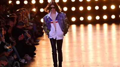 Unzipped tops were paired with dazzling blazers. AFP