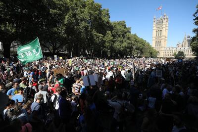Protesters gather near the Houses of Parliament during the Global Climate Strike demonstration in London, U.K., on Friday, September. 20, 2019. Bloomberg