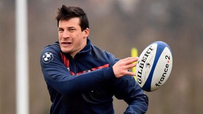 Francois Trinh-Duc takes part in a training drill. The Toulon fly-half has been recalled to start the Six Nations game against England on Saturday. Christophe Simon / AFP