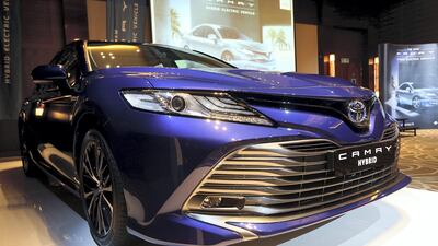 The new Toyota Camry HEV is unveiled at the InterContinental Festival City in Dubai. Satish Kumar for The National