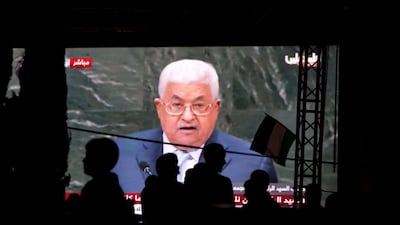 Palestinians watch a broadcast showing a speech by Palestinian President Mahmoud Abbas at the UN General Assembly shown on TV in the West Bank city of Nablus. AP