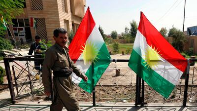 An Iraqi Kurdish man leaves after casting his ballot for the parliamentary election at a polling station in Arbil, the capital of the Kurdish autonomous region in northern Iraq. AFP