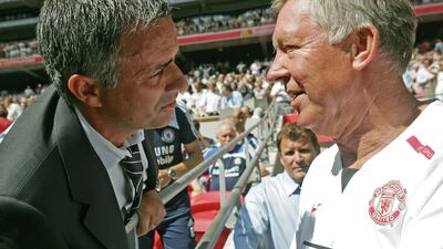 Chelsea's Portugese Manager Jose Mourinho (L) and Manchester United's Manager Sir Alex Ferguson (R) greet each other before their F.A Community Shield match football match at Wembley Stadium in London, 05 August 2007. AFP PHOTO/CARL DE SOUZA