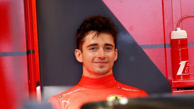 Ferrari's Monegasque driver Charles Leclerc takes rest in the garage during the third practice session at the Albert Park Circuit in Melbourne on April 9, 2022, ahead of the 2022 Formula One Australian Grand Prix. (Photo by Con Chronis / AFP) / -- IMAGE RESTRICTED TO EDITORIAL USE - STRICTLY NO COMMERCIAL USE --