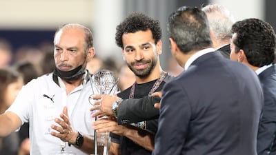 Mohamed Salah receives a personal award from the Egypt Football Association. EPA