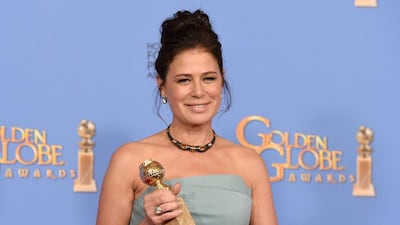 Maura Tierney poses in the press room with the award for best performance by an actress in a series or TV movie for her role in The Affair at the 73rd annual Golden Globe Awards. Jordan Strauss / Invision / AP