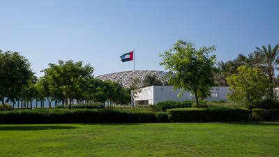 Families can picnic amid the Louvre Abu Dhabi grounds in January. Victor Besa / The National