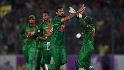 Mashrafe Mortaza of Bangladesh celebrates a wicket in his team's win over England on Sunday. Gareth Copley / Getty Images / October 9, 216