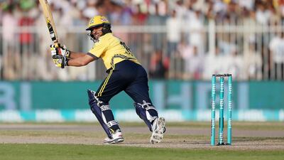 Shahid Afridi of Peshawar Zalmi playing a shot in the Pakistan Super League T20 match against Karachi Kings at Sharjah Cricket Stadium in Sharjah. Pawan Singh / The National