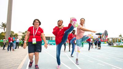 Allyson Felix warms up with Special Olympic athletes. Courtesy: Seven Media