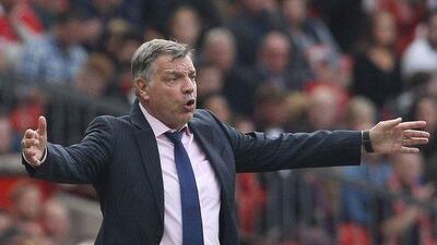 West Ham United manager Sam Allardyce reacts during his side's loss to Manchester United in the Premier League on Saturday. Lindsey Parnaby / AFP / September 28, 2014