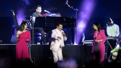 From left: Shweta Mohan, Udit Narayan and Jonita Gandhi on stage.