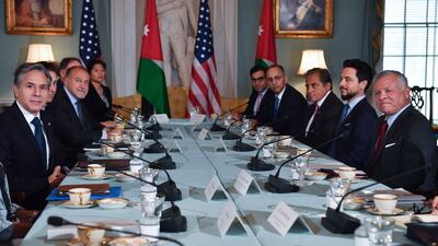At the State Department in Washington, US Secretary of State Antony Blinken, left, meets Jordan's King Abdullah II, right, as Jordan's Crown Prince Hussein, second right, looks on.