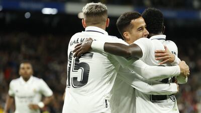Lucas Vazquez celebrates with Real Madrid teammates after scoring against Sevilla. EPA