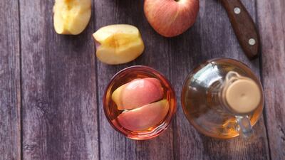 Apple cider vinegar is made of fermented apple juice and has been linked to weight loss. Photo: Towfiqu Barbhuiya / Unsplash