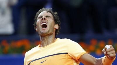 Rafael Nadal celebrates after winning the Barcelona Open, the ninth time he has won the tournament. Manu Fernandez / AP Photo