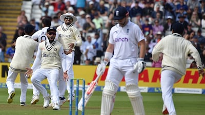 Indian players celebrate the dismissal of England's Ollie Pope for a duck. AP