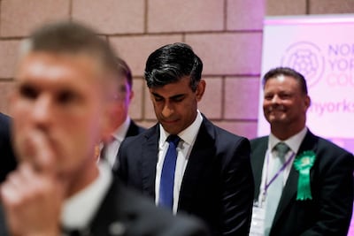 Rishi Sunak bows his head after retaining his seat as MP for Richmond and Northallerton. AFP